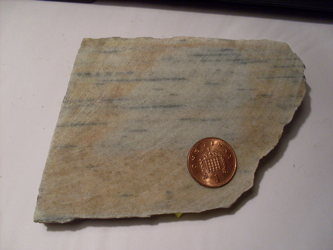 Bo Quartzite from Salangen, South Troms, Norway, showing elongate tourmaline and mica. Photo by Jackdann88, CC BY 3.0 via Wikimedia Commons.
