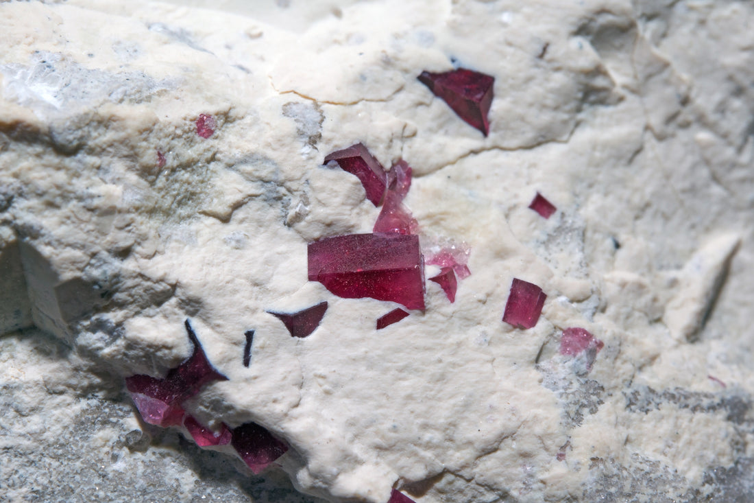Red Beryl in rhyolite from the Ruby Violet claims, Wah Wah Mountains, Utah, USA. Photo by Géry Parent, CC BY-SA 4.0 via Wikimedia Commons.
