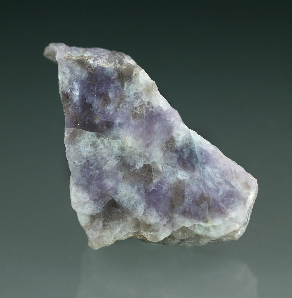 Polished granitoid chip containing rubidium-rich microcline and Rubicline from Vasin-Myl'k Mountain, Kola, Russia. Photo by Joan Rosell, CC BY-SA 4.0 via Wikimedia Commons.