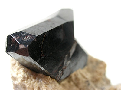 Rutile crystal specimen. Photo by Robert M. Lavinsky / iRocks.com, CC BY-SA 3.0 via Wikimedia Commons.
