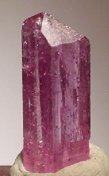 Natural Topaz crystal from Ouro Preto, Minas Gerais, Brazil. Photo by Robert M. Lavinsky / iRocks.com, CC BY-SA 3.0 via Wikimedia Commons.