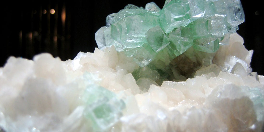Fluorapophyllite on stilbite specimen — Roosters Peacock crystal guide
