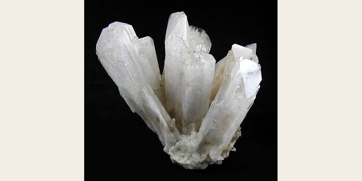 Danburite crystal cluster from Charcas, Mexico — Roosters Peacock crystal guide