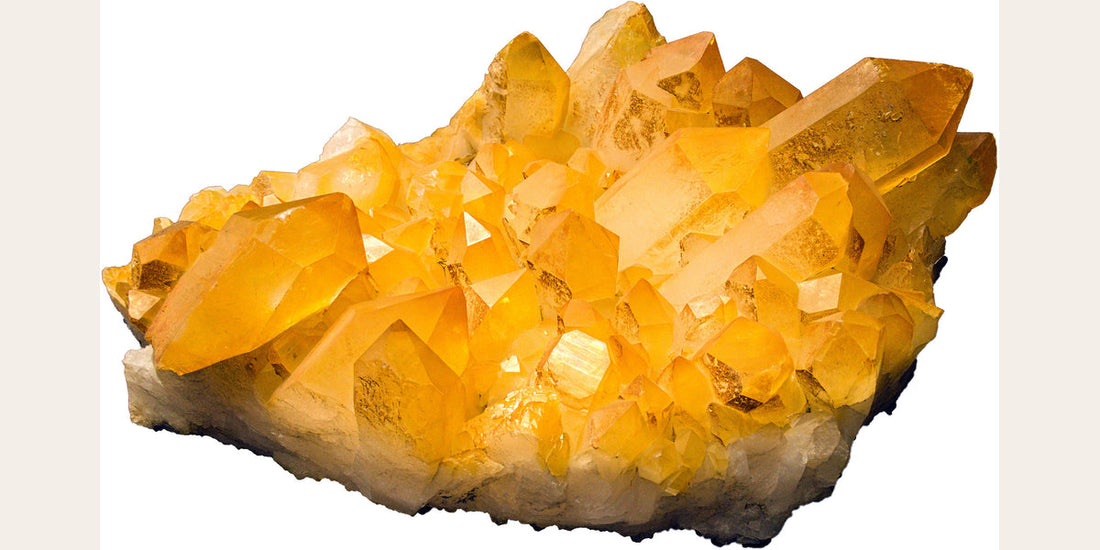 Iron-stained quartz with limonite coating; photo by Tiia Monto via Wikimedia Commons — Roosters Peacock crystal guide