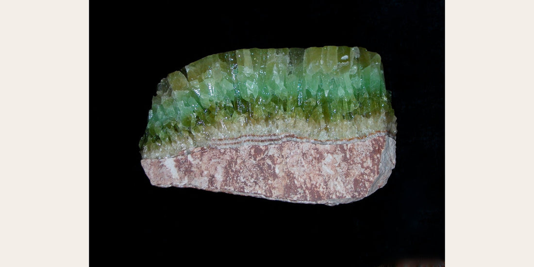 Green calcite specimen from Mexico; public domain via Wikimedia Commons — Roosters Peacock crystal guide