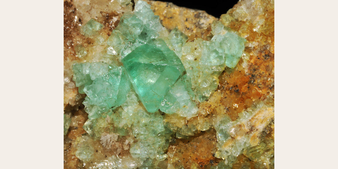 Green fluorite crystals from Berta Mine, Spain; photo by Géry Parent, CC BY-SA 3.0 — Roosters Peacock crystal guide
