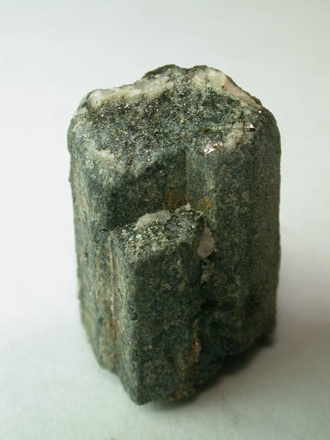Natural Kornerupine crystal from Mt Riddock Station, Northern Territory, Australia; John Sobolewski, CC BY 3.0 — Roosters Peacock crystal guide