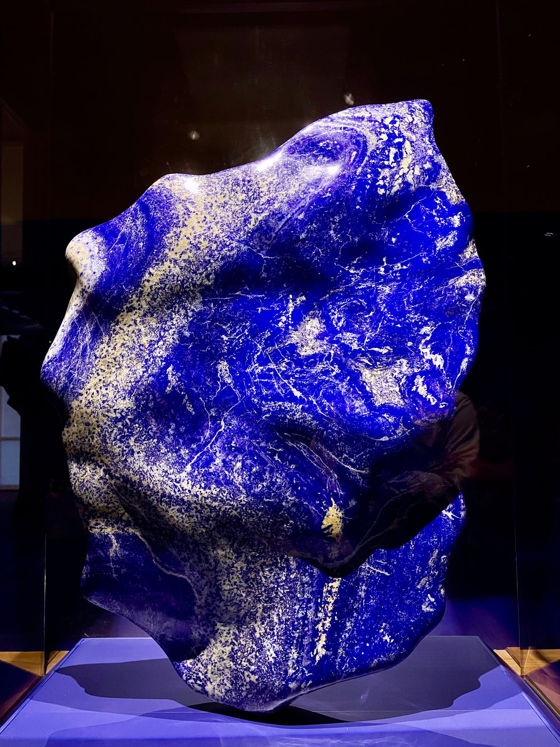 Large natural lapis lazuli specimen at the Smithsonian National Museum of Natural History; Kplans, CC BY-SA 4.0 — Roosters Peacock crystal guide