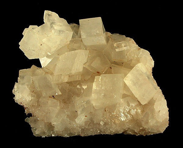 Natural magnesite crystal specimen from Brumado, Bahia, Brazil; Wikimedia Commons specimen photograph — Roosters Peacock crystal guide