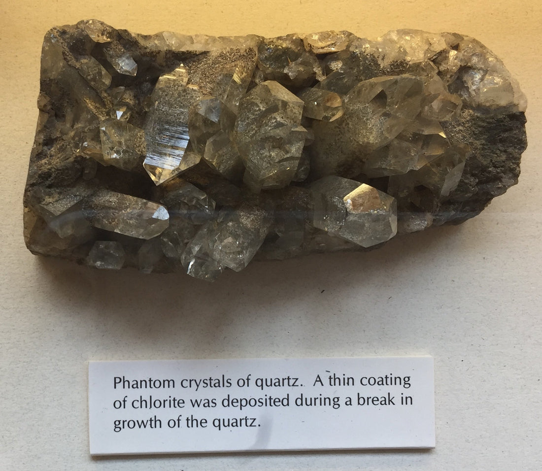 Natural phantom quartz specimen at the Oxford University Museum of Natural History; BVBurton, CC BY-SA 4.0 — Roosters Peacock crystal guide