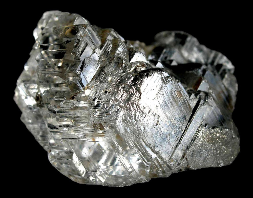 Natural phenakite crystal from the Bauchi Plateau, Nigeria; Rob Lavinsky, CC BY-SA 3.0 — Roosters Peacock crystal guide