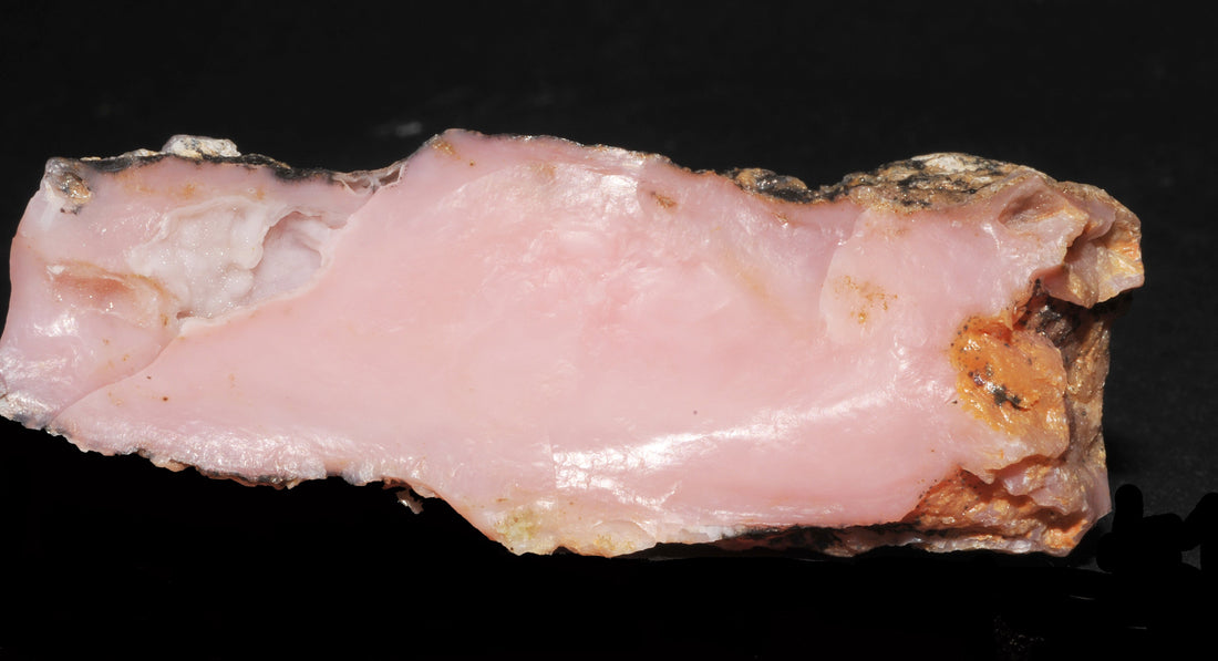 Natural pink opal from the northern Arequipa area, Peru; Parent Géry, CC BY-SA 3.0 — Roosters Peacock crystal guide