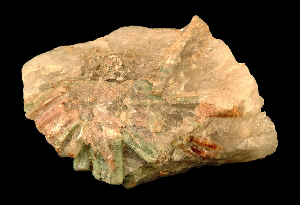 Natural pink tourmaline (rubellite) specimen from the Black Hills, South Dakota; Shannon Heinle / GeoDIL, CC0 — Roosters Peacock crystal guide