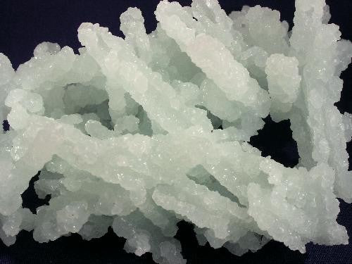 Natural prehnite specimen from Lonavala, Maharashtra, India; Rob Lavinsky, CC BY-SA 3.0 — Roosters Peacock crystal guide