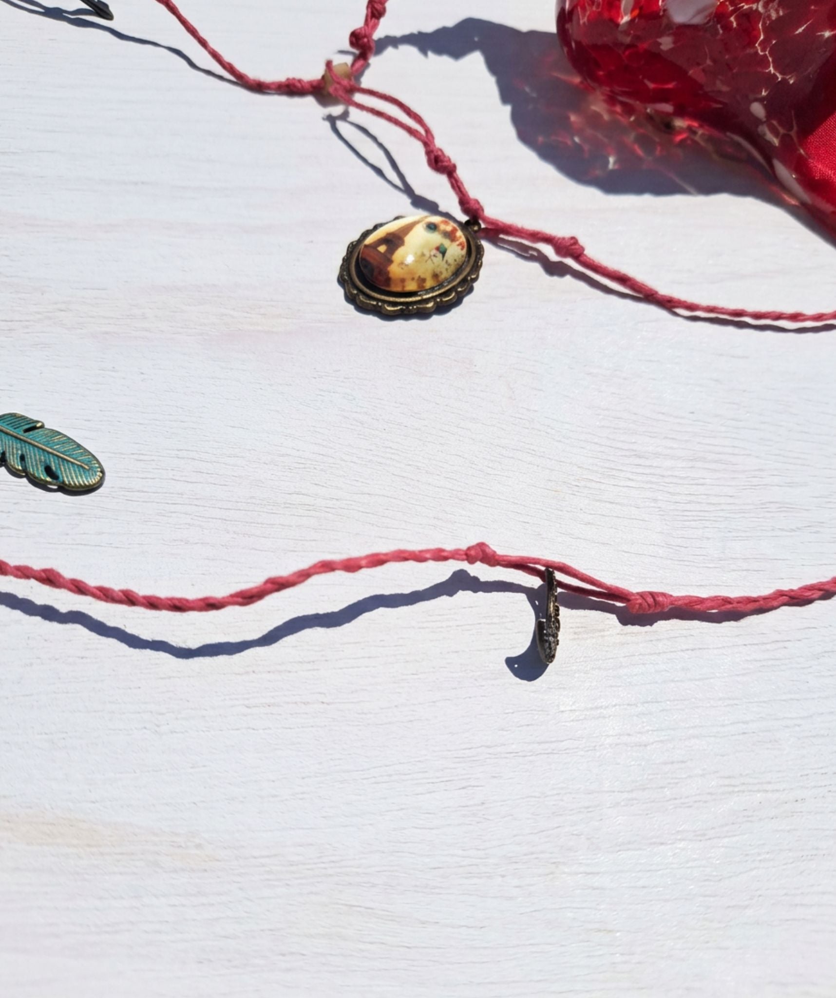 Red Speckled Hand Blown Glass Finial Suncatcher Ornament with Intention Charm Cord