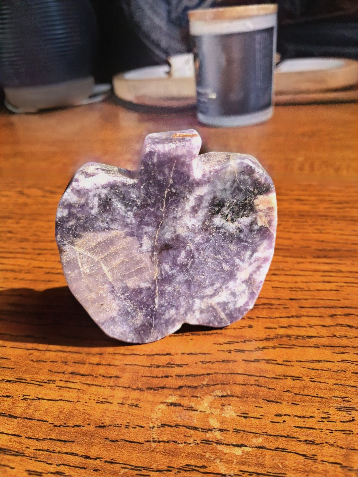 Amethyst polished flat pumpkin carving, 2.5 inches, violet purple white veining and mineral inclusions, upright on wood