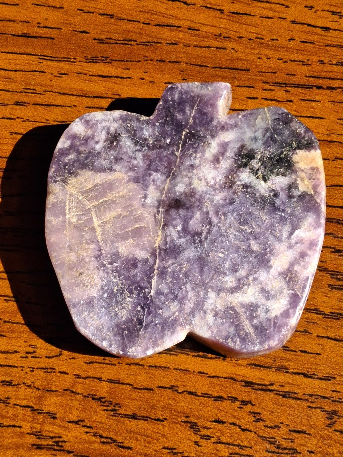 Polished amethyst pumpkin angled original photo with natural purple and black markings