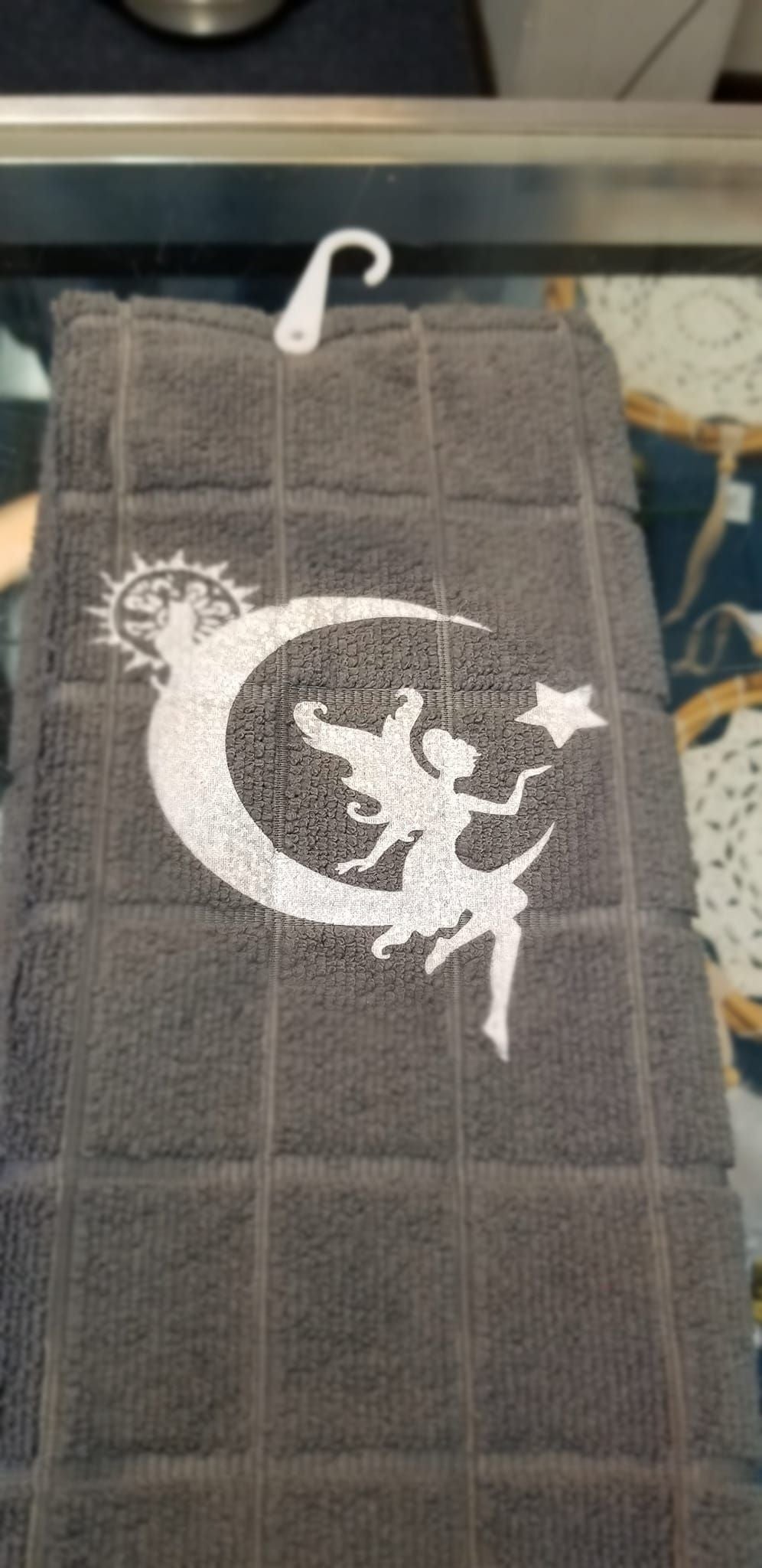 Gray microfiber fairy moon towel folded showing grid waffle texture and full design