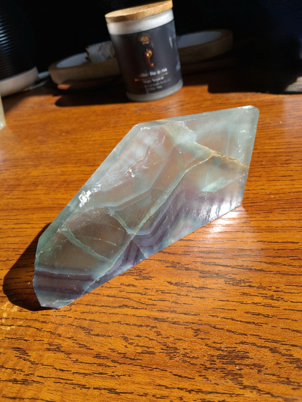 Rainbow Fluorite slab natural green lavender purple banded translucent irregular polished mineral, full oblique view
