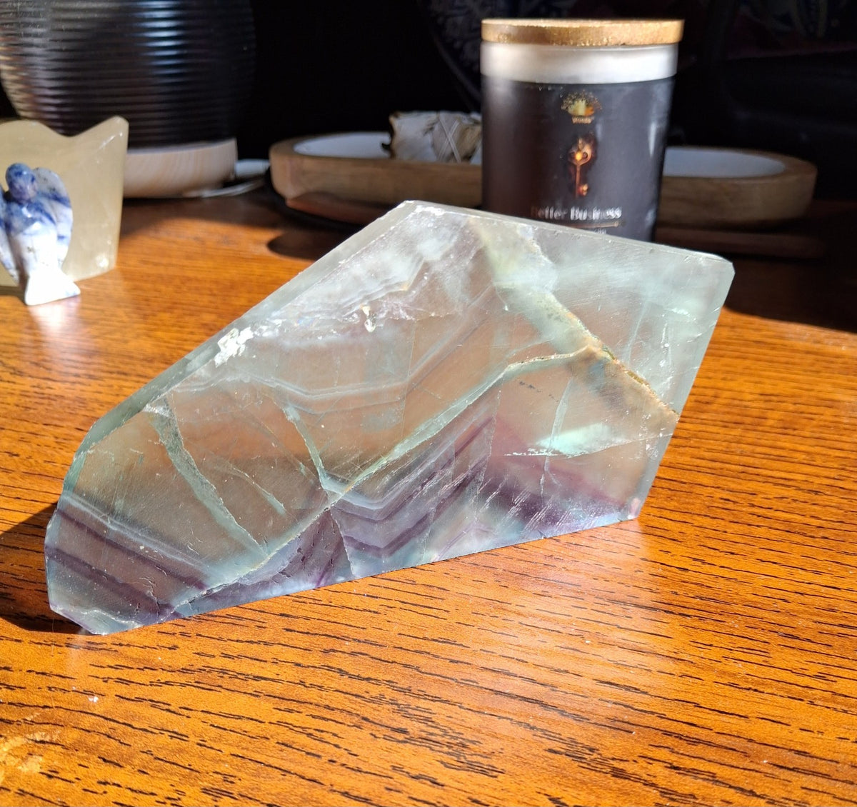 Rainbow Fluorite crystal elongated slab thin green to violet natural banding angled photo