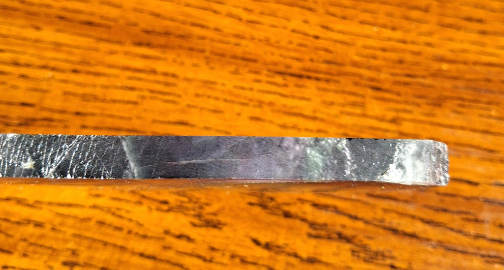 Full length Rainbow Fluorite slab 5.5 inch polished crystal stone on wooden table