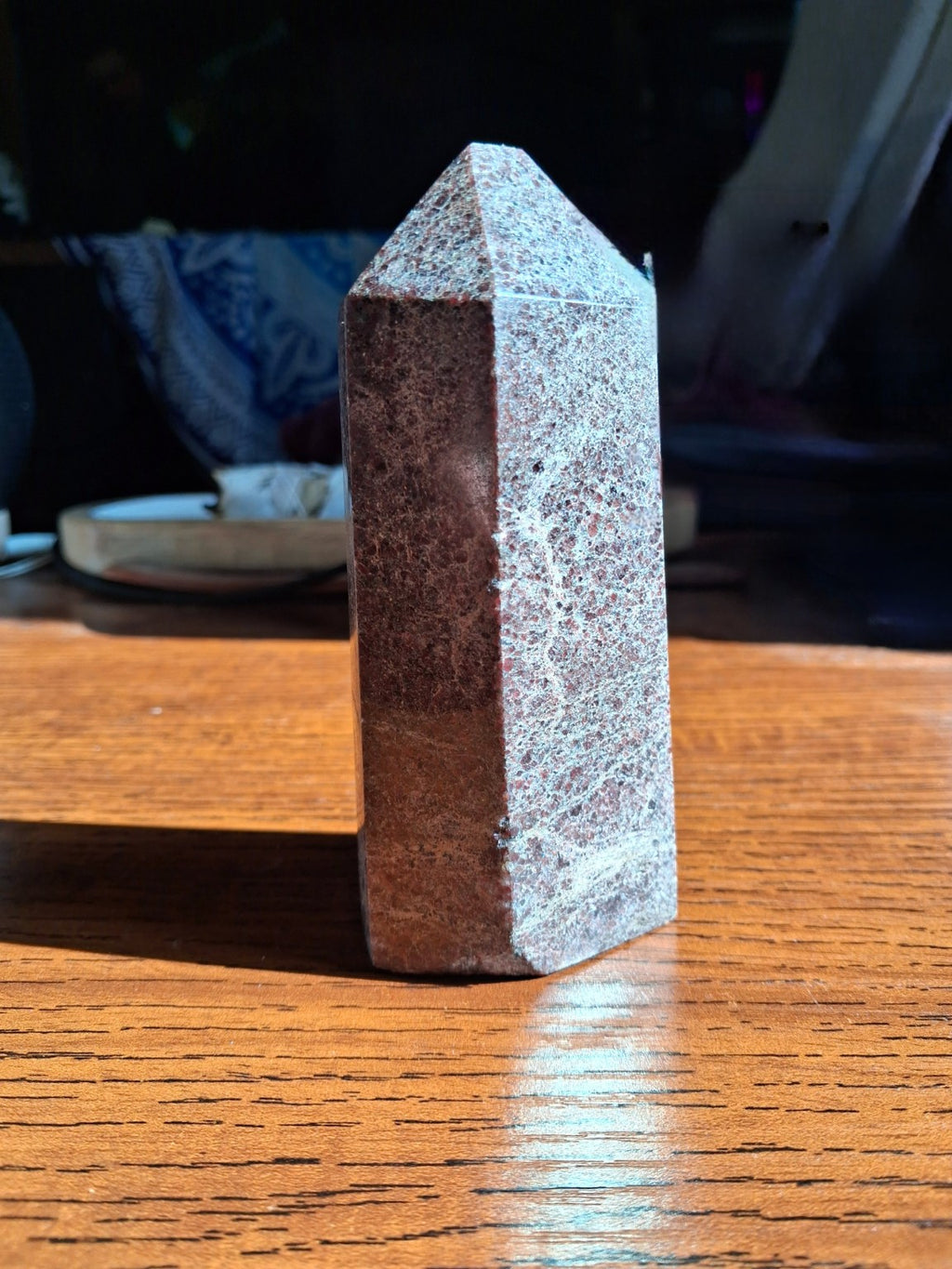 Natural garnet-in-matrix crystal tower 1 lb 11 oz original photograph standing on wooden table