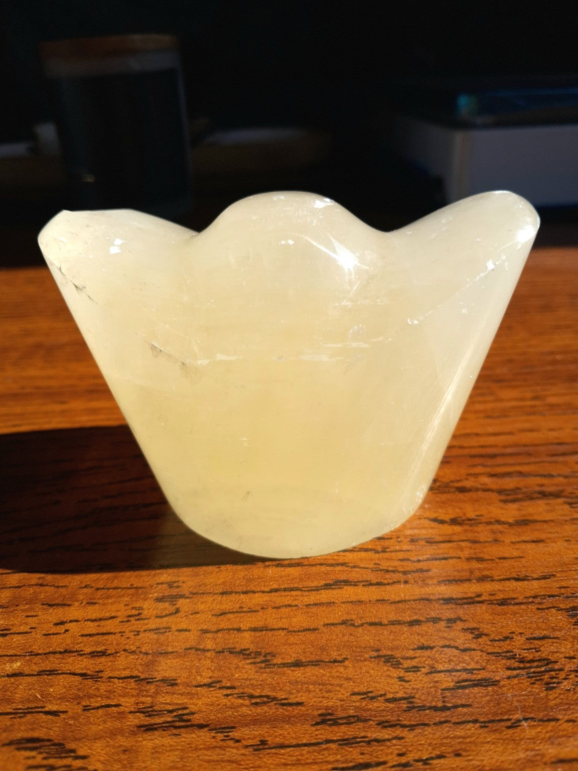 Genuine Honey Calcite yuanbao money ingot polished pale golden stone, full frontal view, 13.86 oz