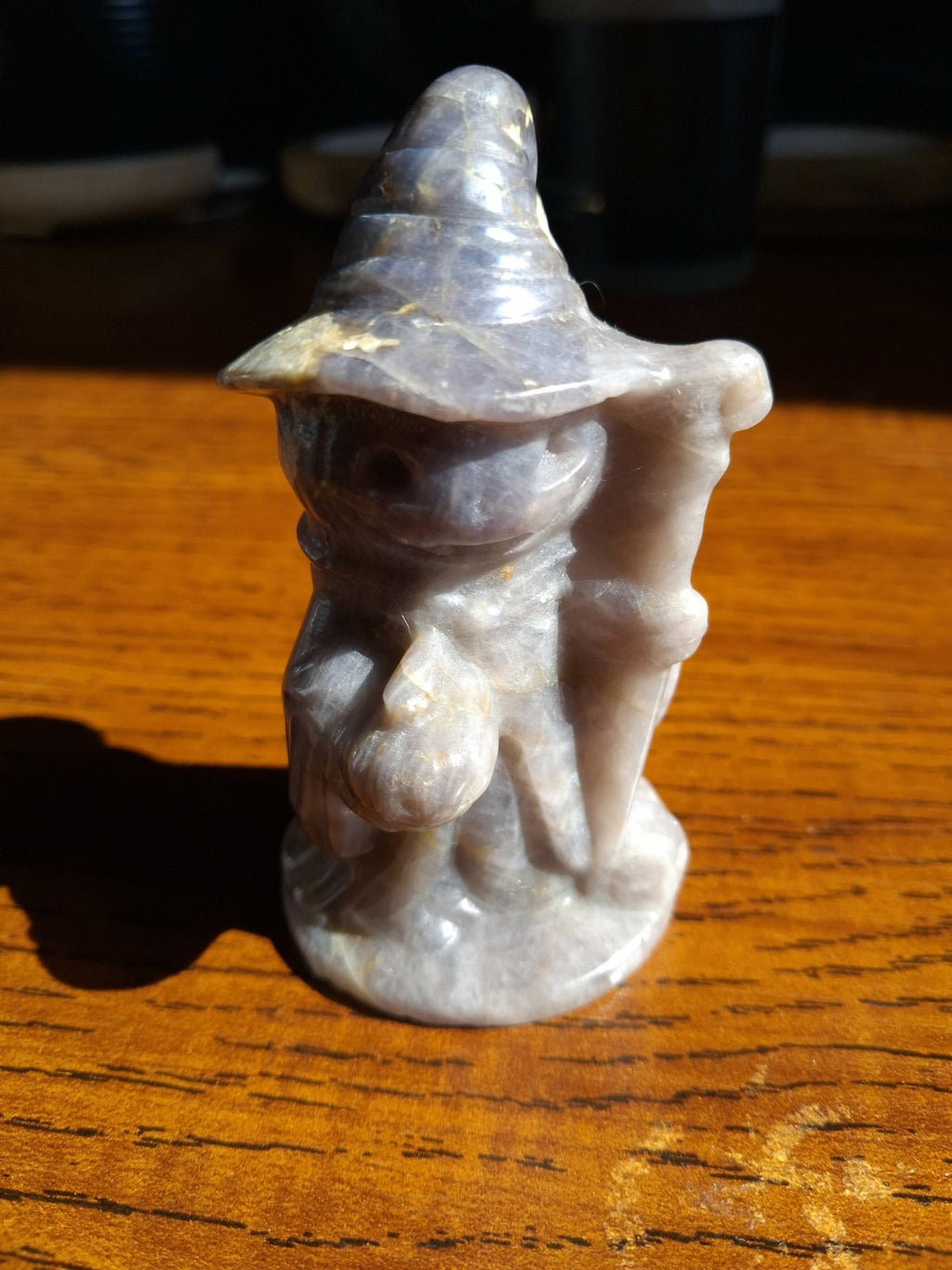 Front view of amethyst pumpkin witch jack-o'-lantern polished carving, 3 inches tall, 4.76 oz
