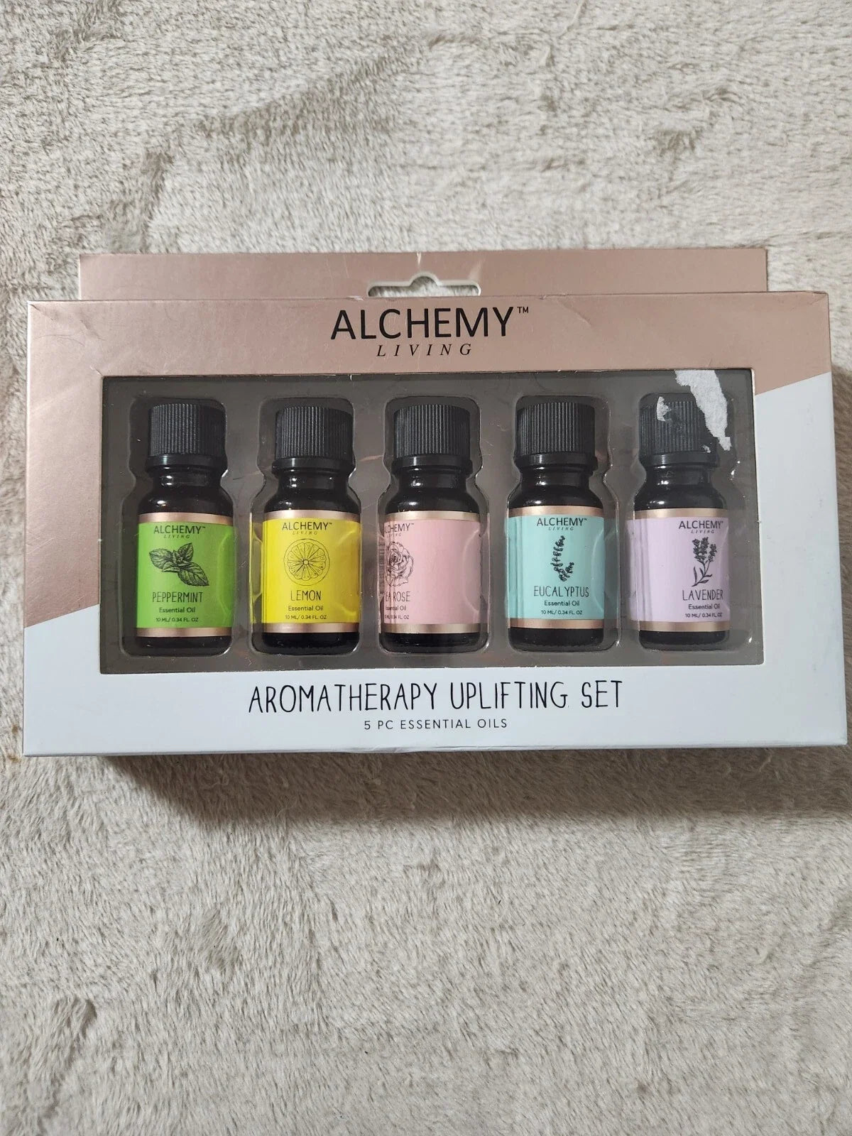 Alchemy Living Uplifting Aromatherapy Set with five essential oils included in the Healing and Comfort Intention Kit